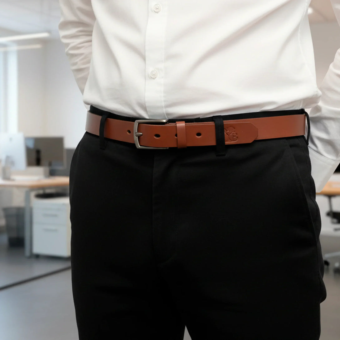 Personalized leather belt worn with black pants and white shirt in office, men’s gift set
